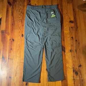 Men’s gray REI Sahara Roll-up pants. Size 38W x 34L.